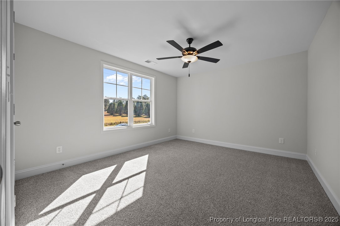 3202 Cameron Hill Road Cameron, NC 28326 - Photo 30 of 45 a view of an empty room with a window