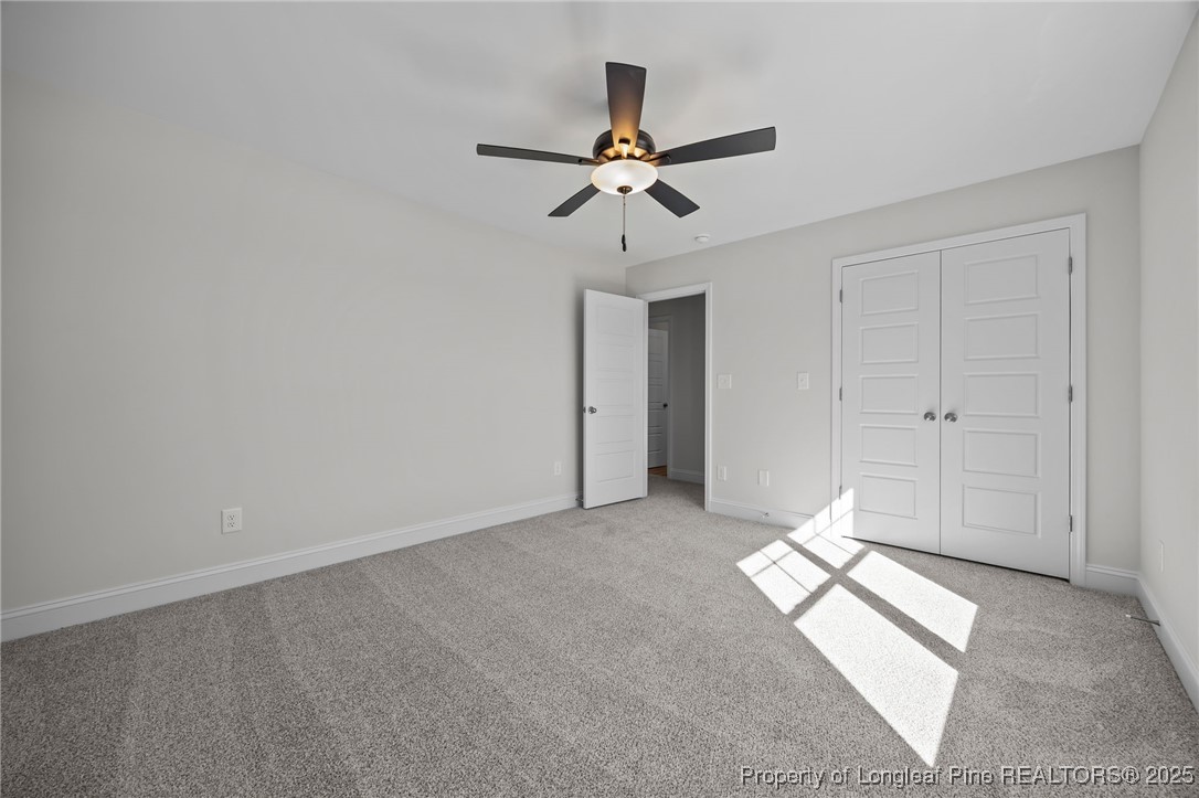 3202 Cameron Hill Road Cameron, NC 28326 - Photo 31 of 45 a view of empty room with ceiling fan