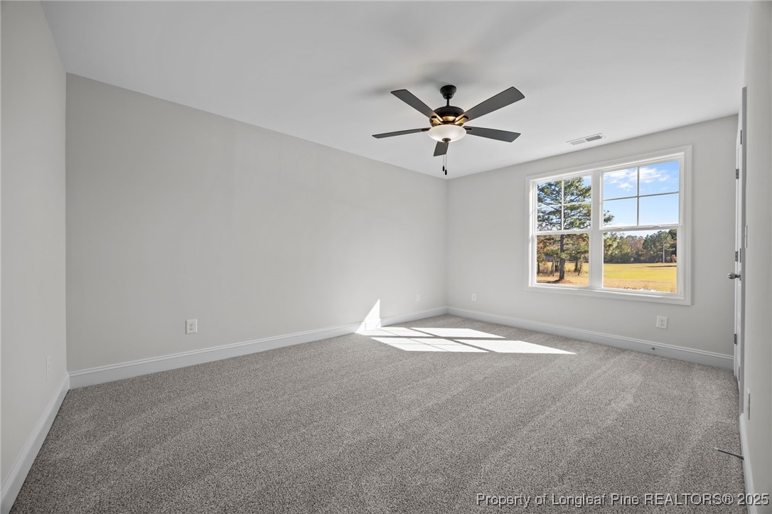 3202 Cameron Hill Road Cameron, NC 28326 - Photo 32 of 45 a view of an empty room with a window