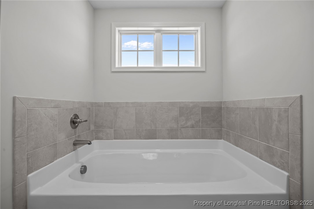 3202 Cameron Hill Road Cameron, NC 28326 - Photo 39 of 45 a bathroom with a bathtub