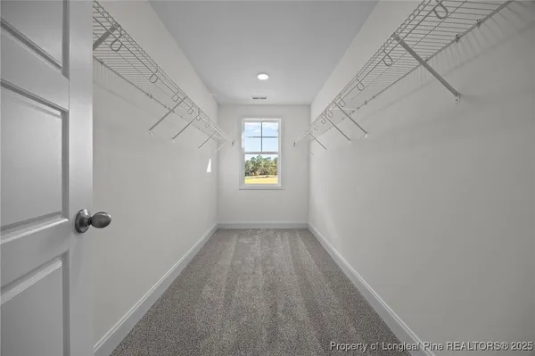 a view of a garage with furniture and a window