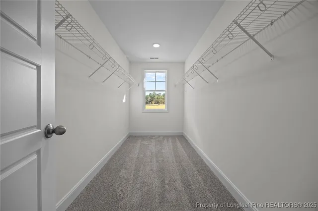 a view of a garage with furniture and a window