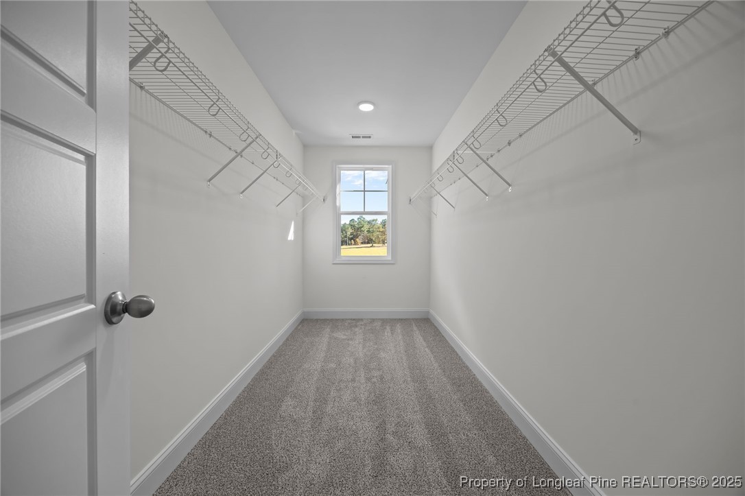 3202 Cameron Hill Road Cameron, NC 28326 - Photo 40 of 45 a view of an empty room with a window