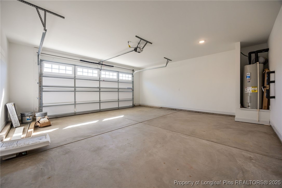 3202 Cameron Hill Road Cameron, NC 28326 - Photo 41 of 45 a view of a garage with furniture and a window