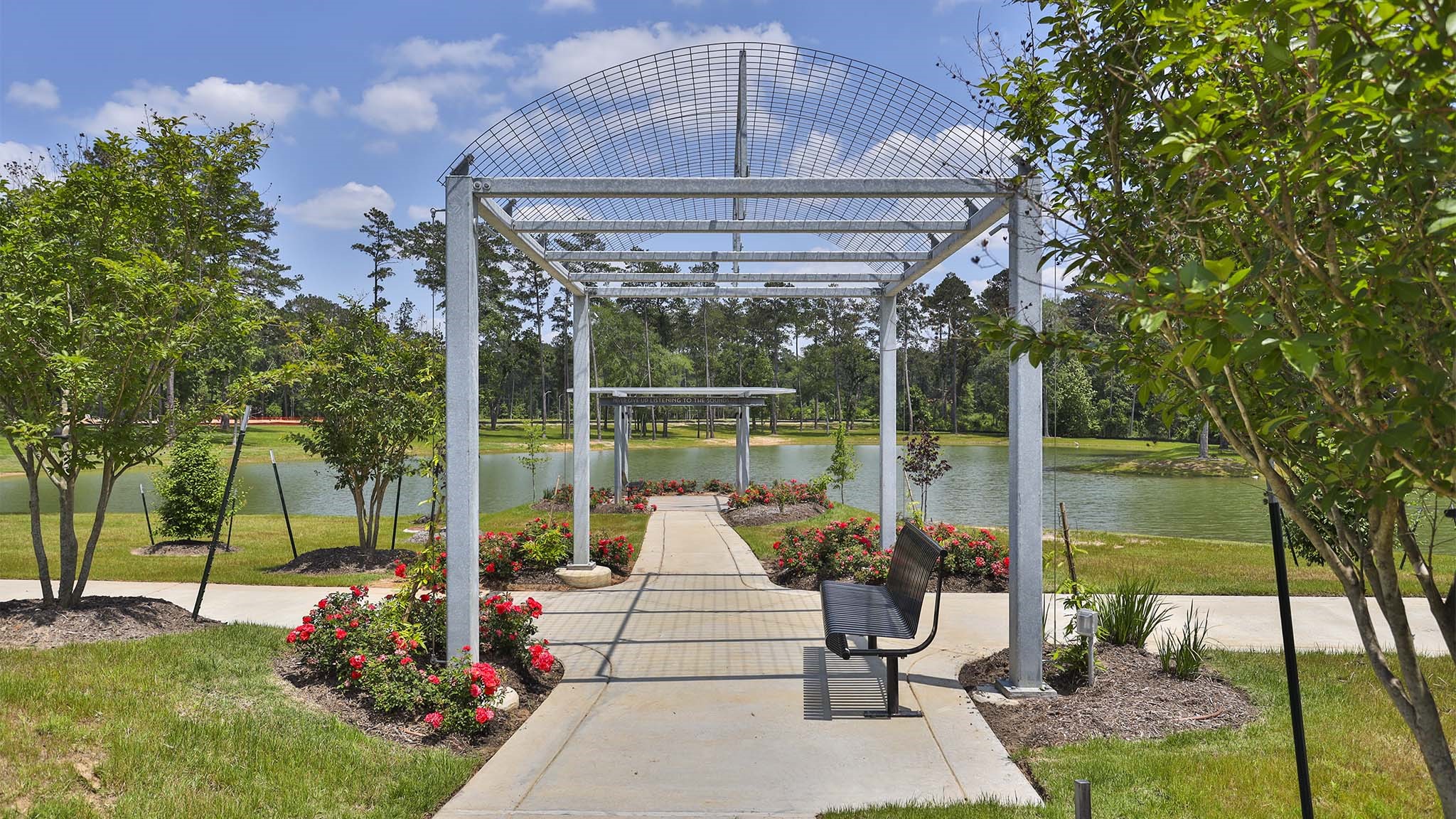 39111 Dangling Crest Magnolia, TX 77354 - Photo 9 of 9 a view of a patio with a table chairs and a backyard
