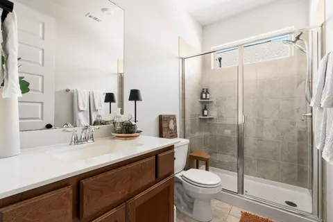 a bedroom with furniture and window