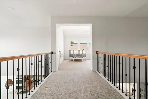 a bedroom with a workspace