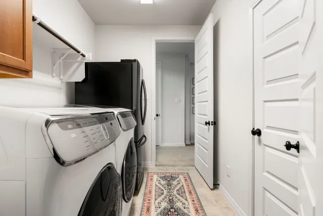 a view of a two chairs in the porch