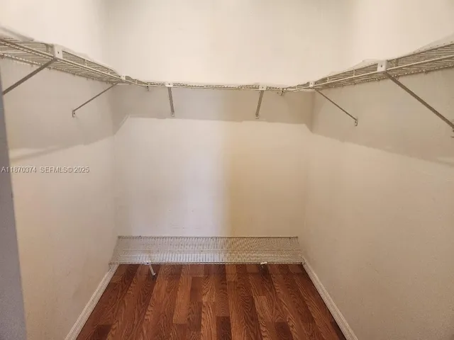 a view of a room with racks on the wall