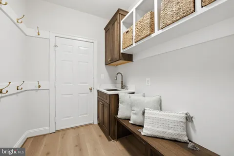 a bedroom with bed and window
