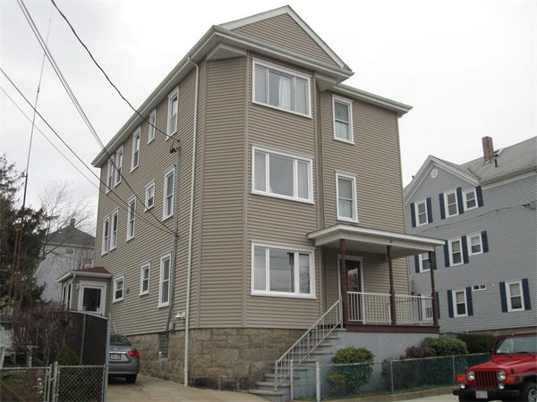 65 Oxford Street Fall River, MA 02721 - Photo 1 of 14 a front view of a house
