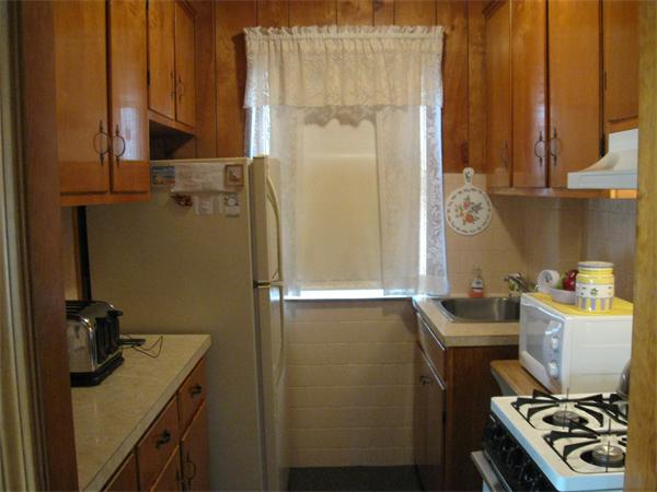 65 Oxford Street Fall River, MA 02721 - Photo 4 of 14 a room with storage and utility