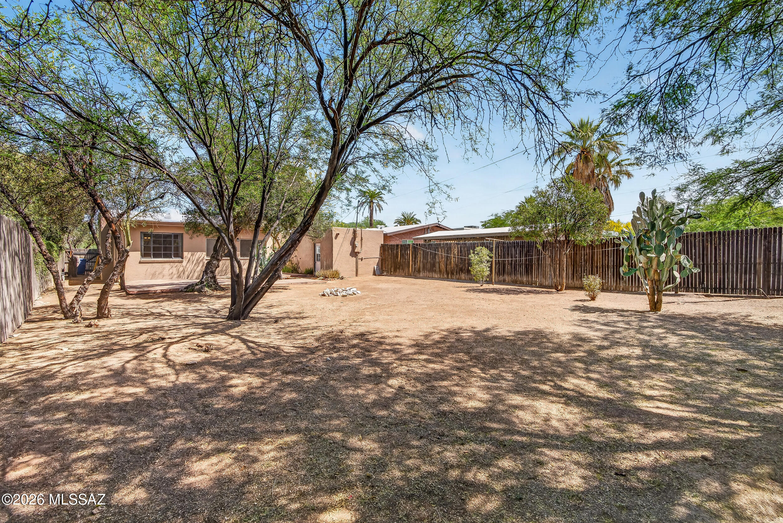 1412 East Spring Street Tucson, AZ 85719 - Photo 36 of 43 a front view of a house with a yard