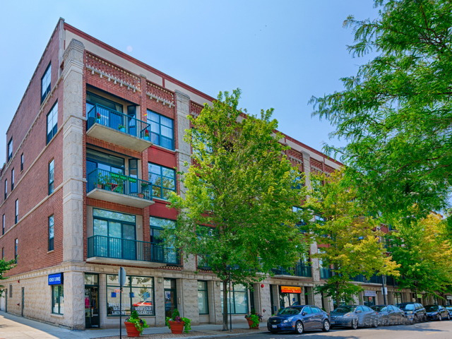 841 West Monroe Street, Unit 3A Chicago, IL 60607 - Photo 1 of 17 a front view of a multi story building with trees
