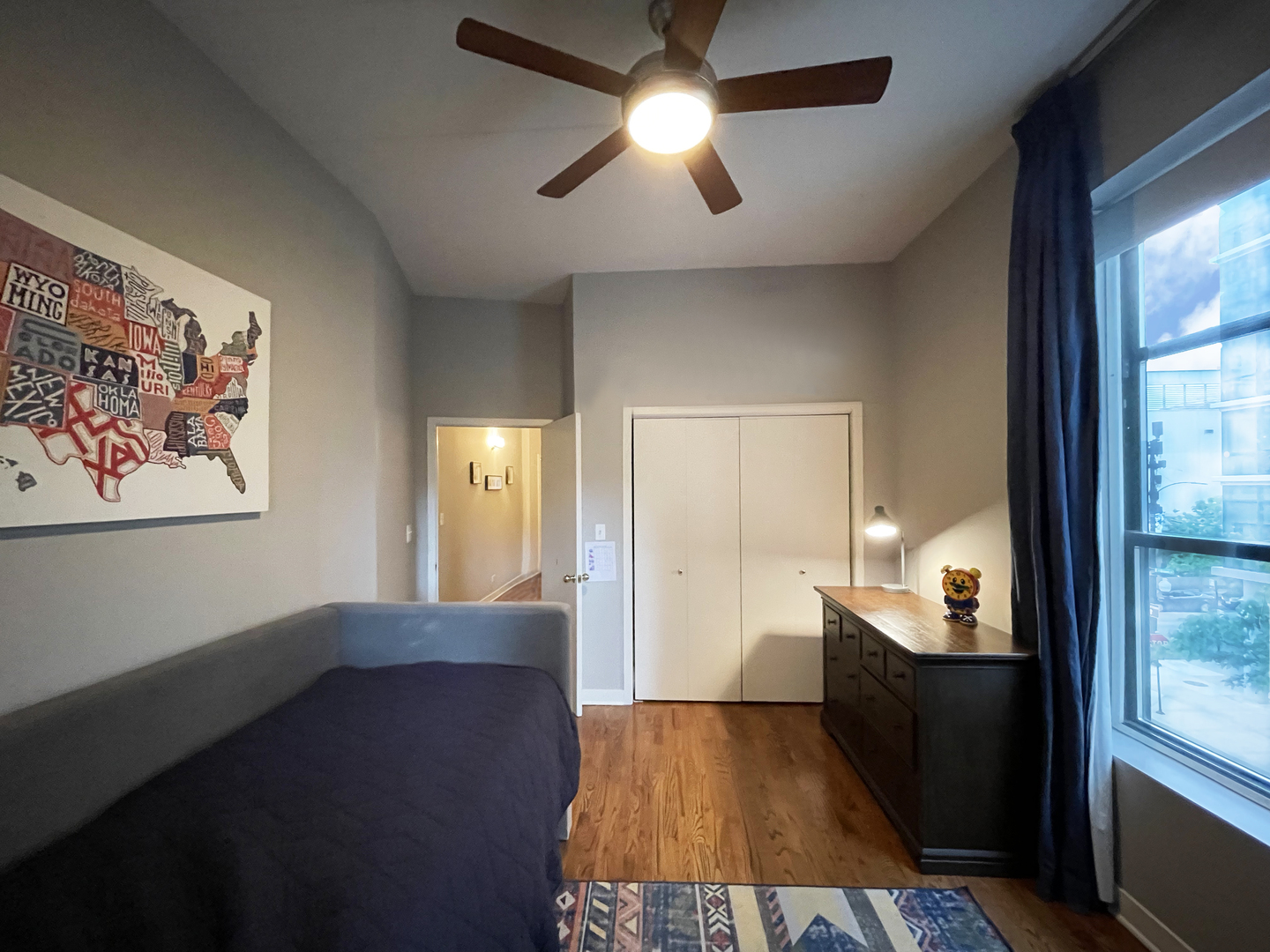 841 West Monroe Street, Unit 3A Chicago, IL 60607 - Photo 10 of 17 a view of a hallway with a window and a chandelier