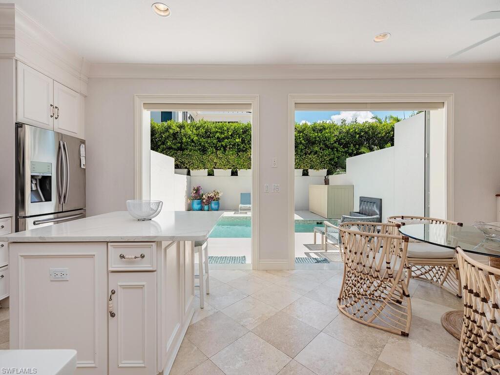 165 5th Street South, Unit 3 Naples, FL 34102 - Photo 5 of 20 a very nice looking dining room with a large window
