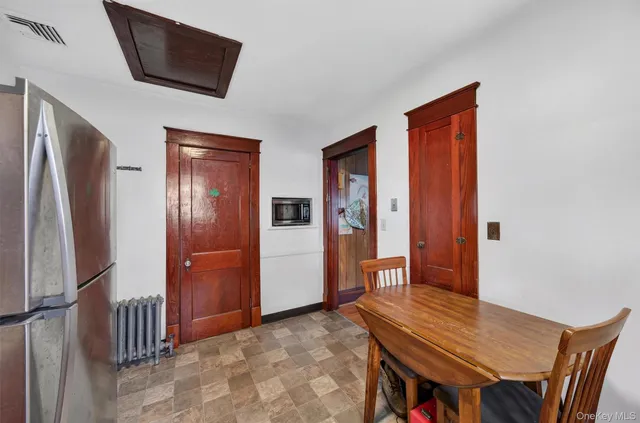 a view of a livingroom with furniture and front door