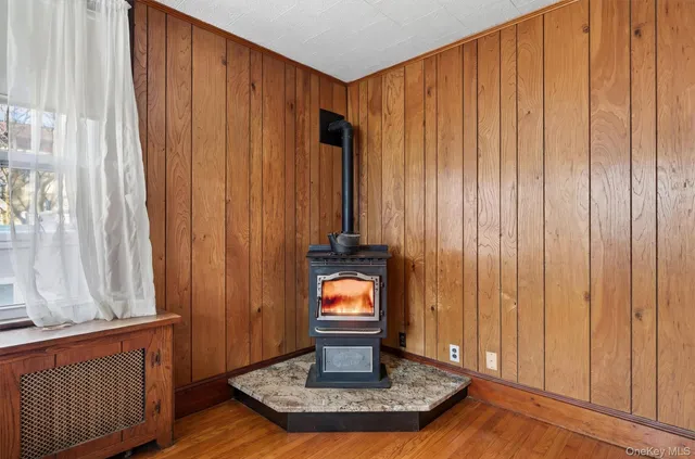a view of a livingroom with a door and wooden door