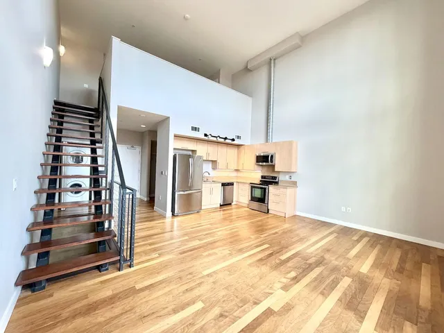 a view of kitchen with furniture and window