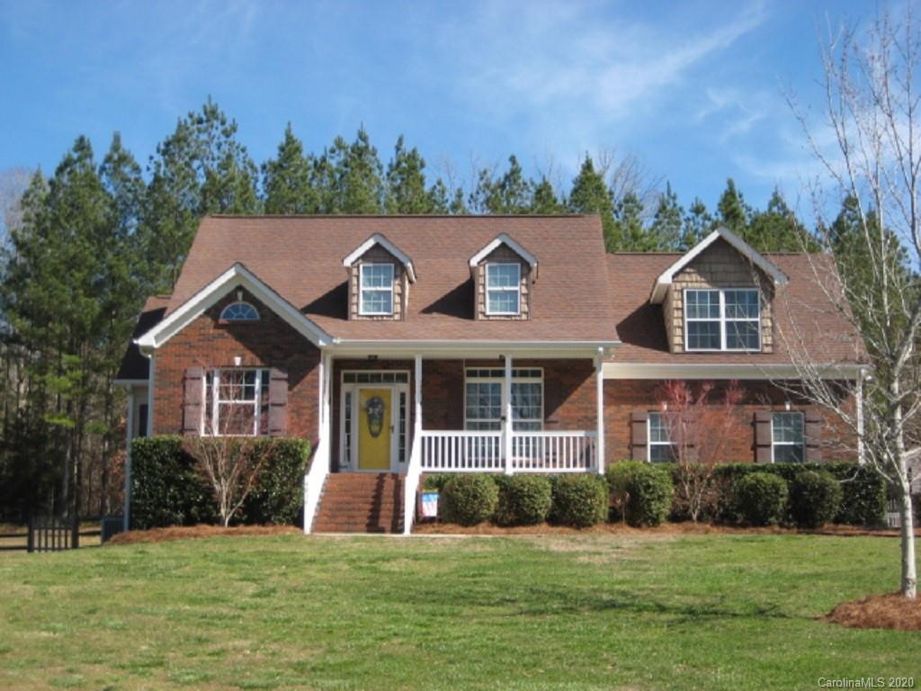 4014 Ruston Creek Road, Unit 86 Catawba, SC 29704 - Photo 1 of 48 a front view of a house with a garden