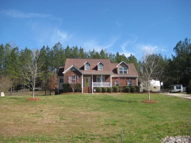 4014 Ruston Creek Road, Unit 86 Catawba, SC 29704 - Photo 2 of 48 a view of a big house with a big yard and large trees