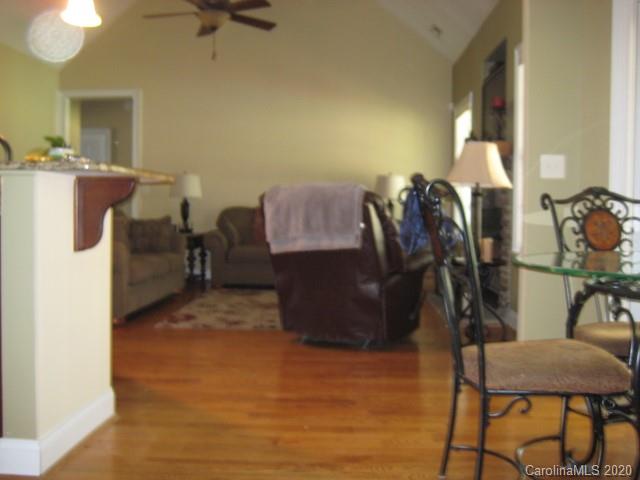 4014 Ruston Creek Road, Unit 86 Catawba, SC 29704 - Photo 16 of 48 a living room with furniture and a flat screen tv