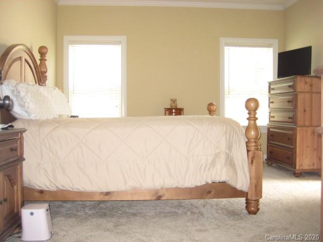 4014 Ruston Creek Road, Unit 86 Catawba, SC 29704 - Photo 26 of 48 a bedroom with a bed and a flat screen tv