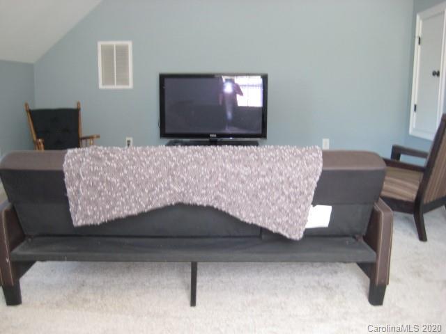 4014 Ruston Creek Road, Unit 86 Catawba, SC 29704 - Photo 35 of 48 a living room with furniture and a flat screen tv