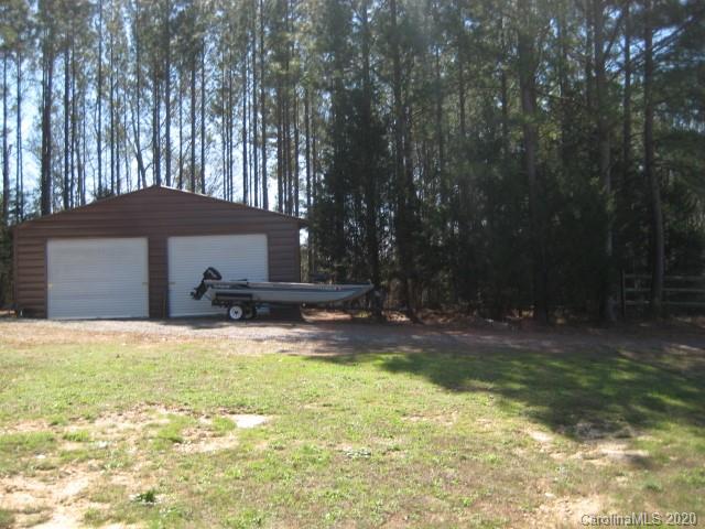 4014 Ruston Creek Road, Unit 86 Catawba, SC 29704 - Photo 40 of 48 a view of a house with backyard and sitting area