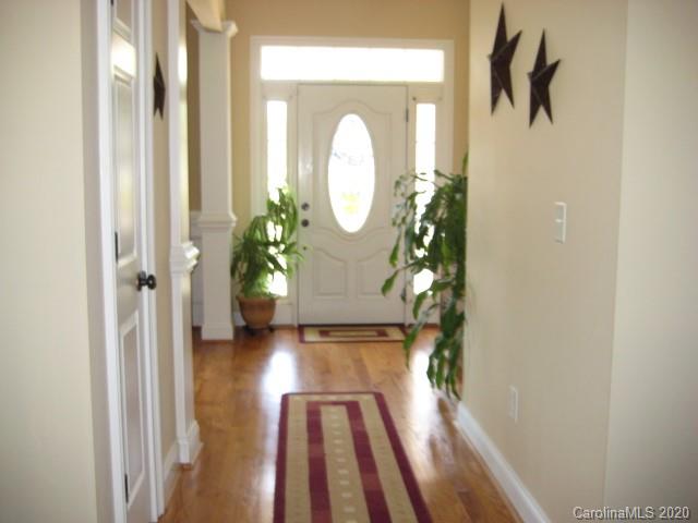 4014 Ruston Creek Road, Unit 86 Catawba, SC 29704 - Photo 5 of 48 a view of a porch with wooden floor