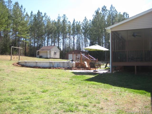4014 Ruston Creek Road, Unit 86 Catawba, SC 29704 - Photo 47 of 48 a wooden bench sitting in the middle of a yard