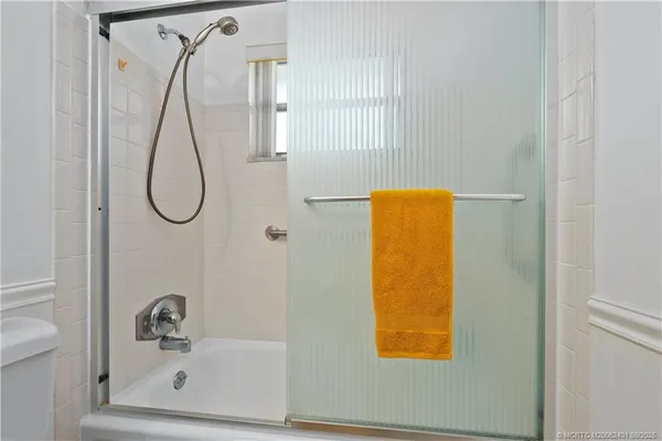 a living room with large windows