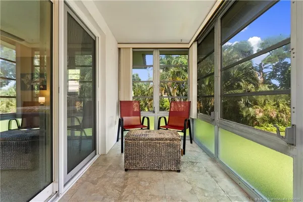 a view of a bathroom with a glass door