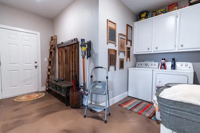 a room with furniture and gym equipment