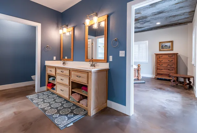 a very nice looking room with a large mirror