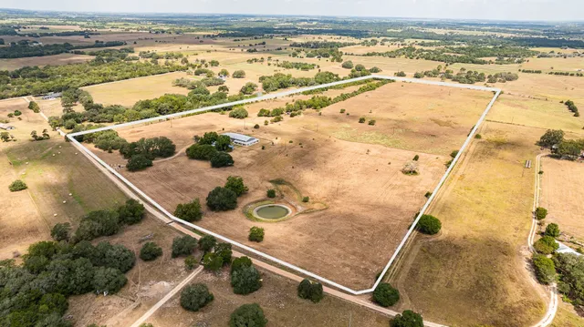 an aerial view of beach and ocean