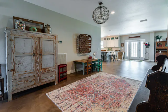a living room with furniture and a table