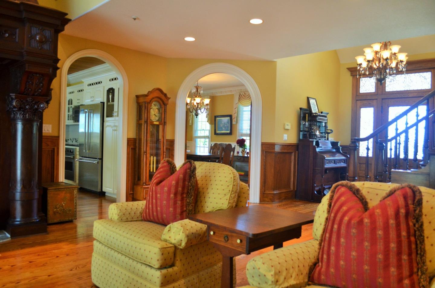 385 Tolak Road Aptos, CA 95003 - Photo 11 of 82 a living room with furniture a chandelier and a large window