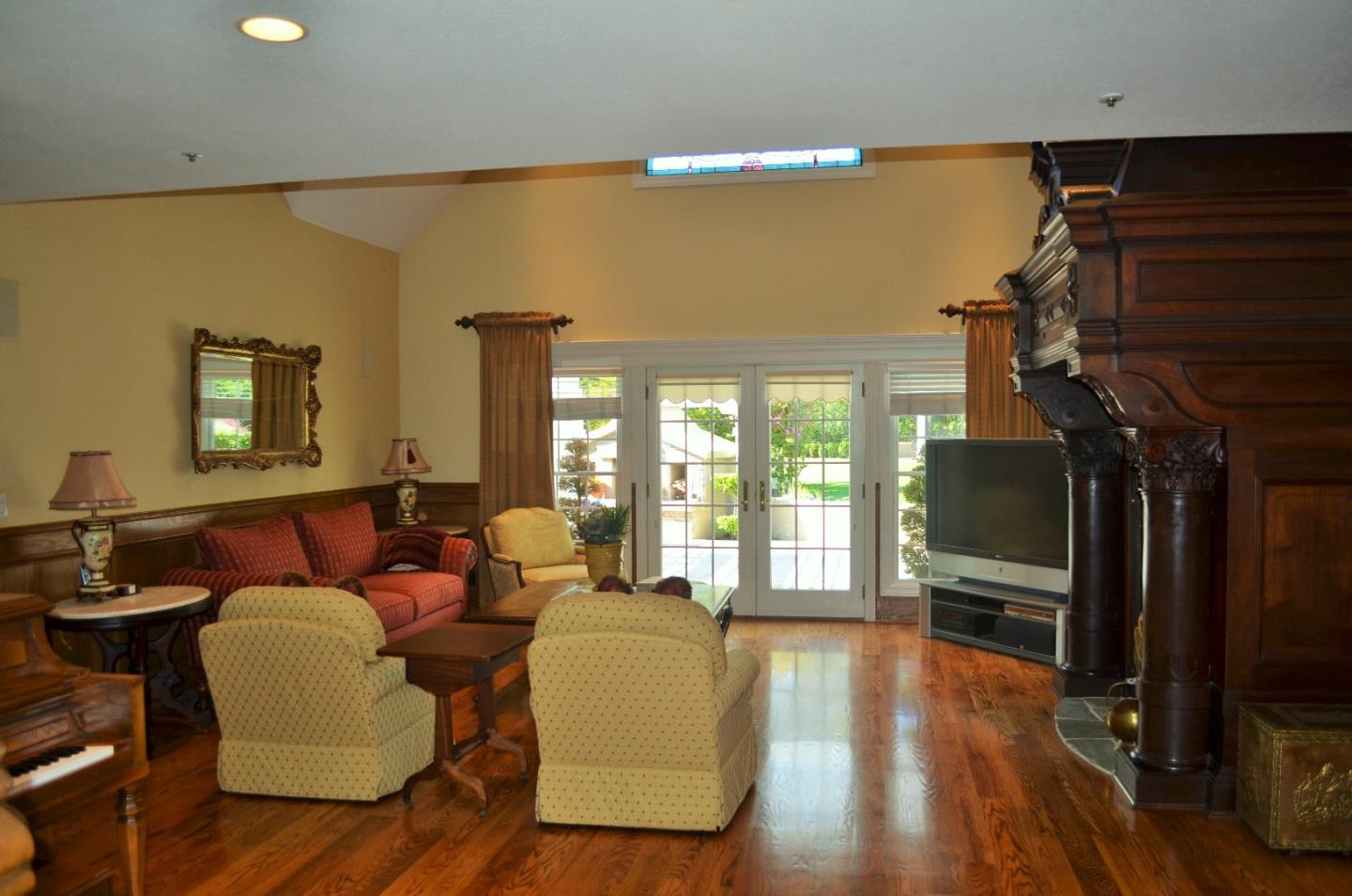 385 Tolak Road Aptos, CA 95003 - Photo 12 of 82 a living room with furniture and a flat screen tv