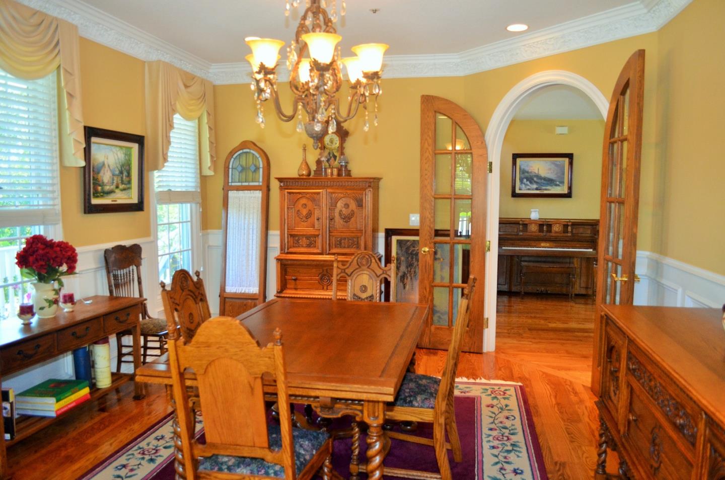 385 Tolak Road Aptos, CA 95003 - Photo 14 of 82 a dining room with furniture and chandelier