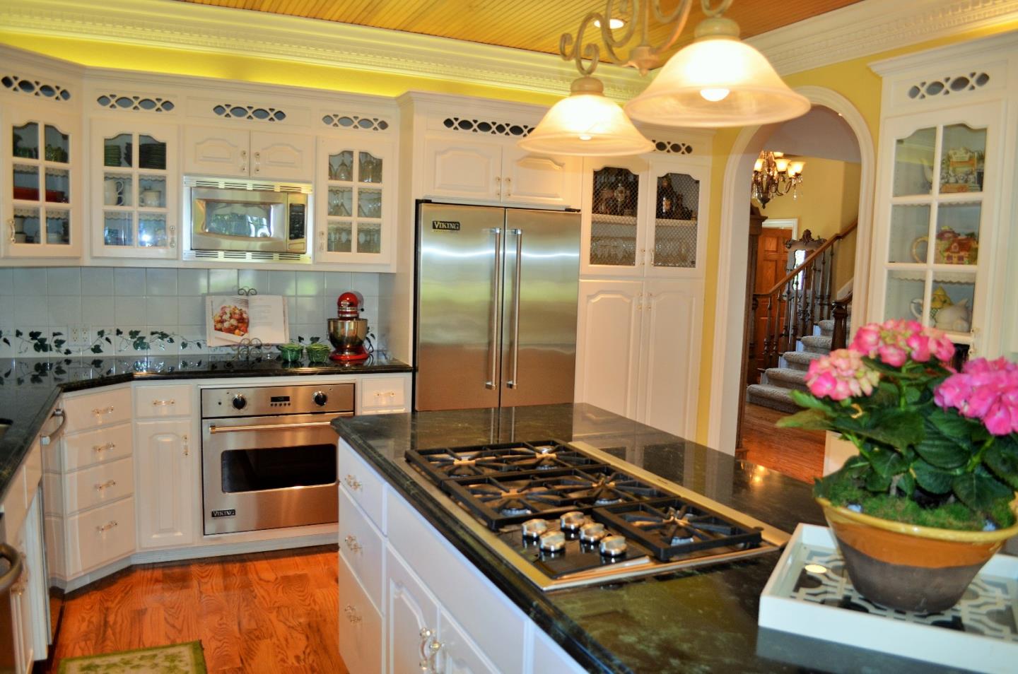 385 Tolak Road Aptos, CA 95003 - Photo 16 of 82 a kitchen with stainless steel appliances granite countertop a stove a sink and a refrigerator