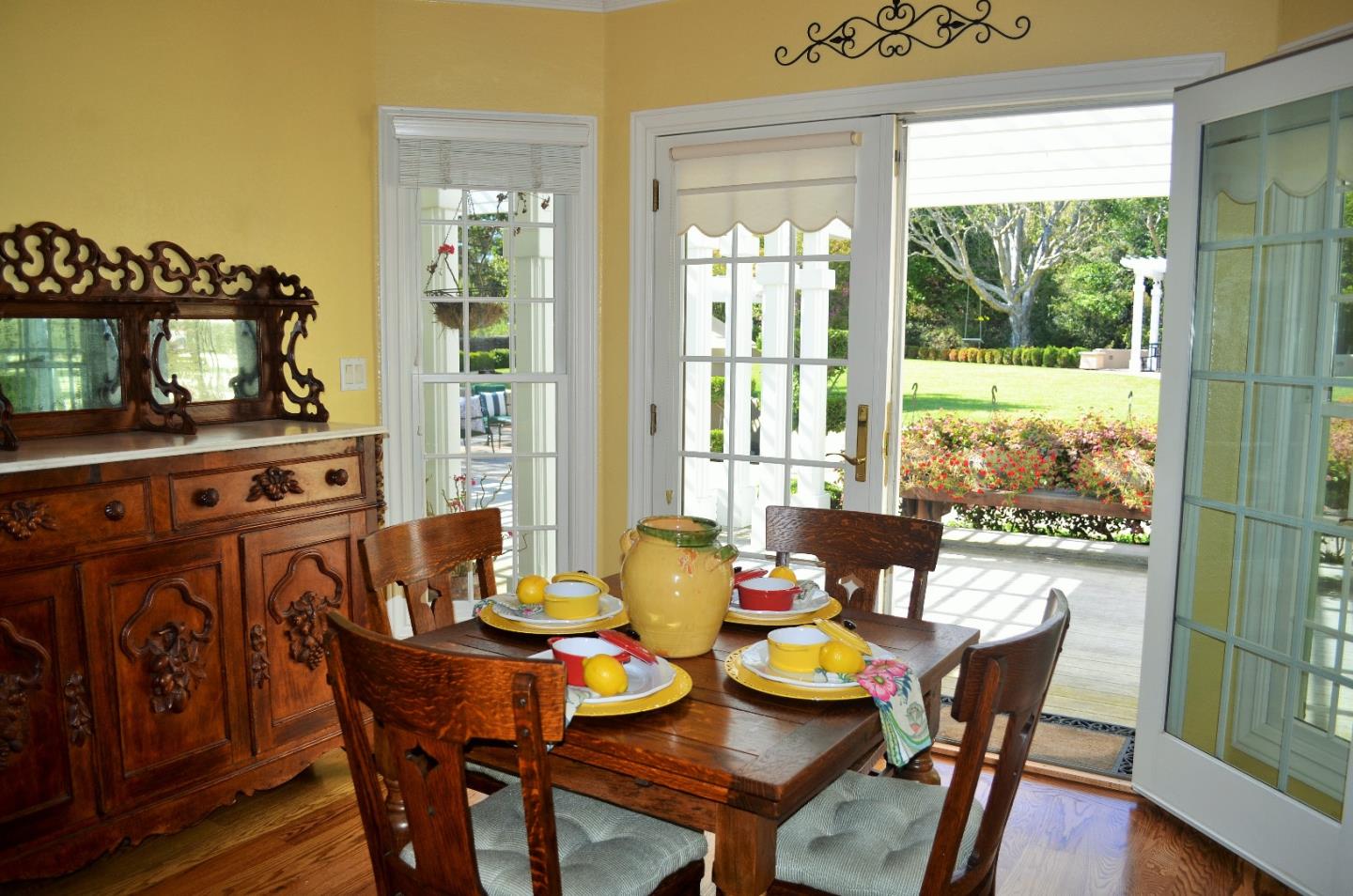 385 Tolak Road Aptos, CA 95003 - Photo 22 of 82 a view of a dining room with furniture window and wooden floor