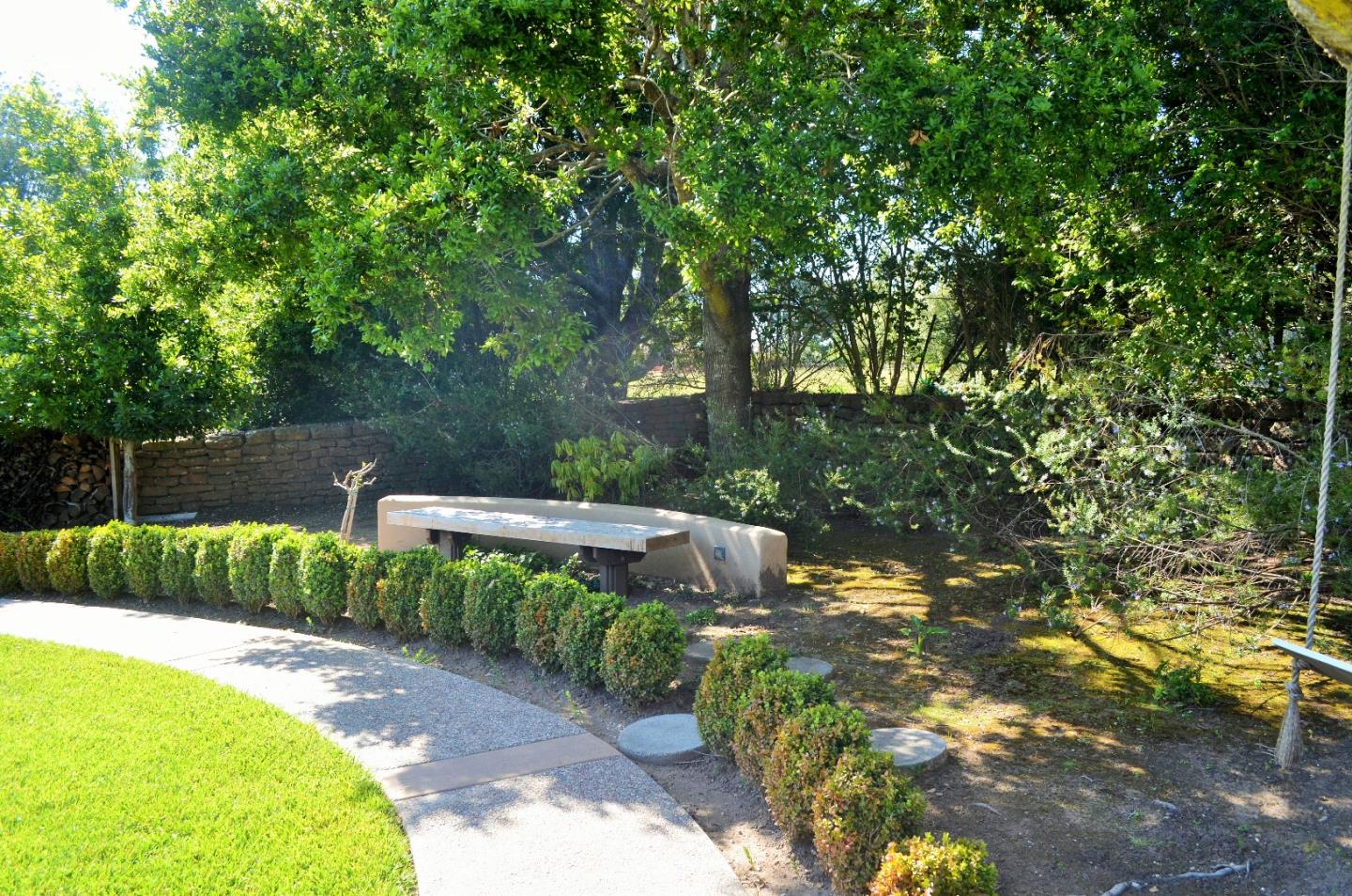 385 Tolak Road Aptos, CA 95003 - Photo 33 of 82 a view of a backyard with plants and large trees