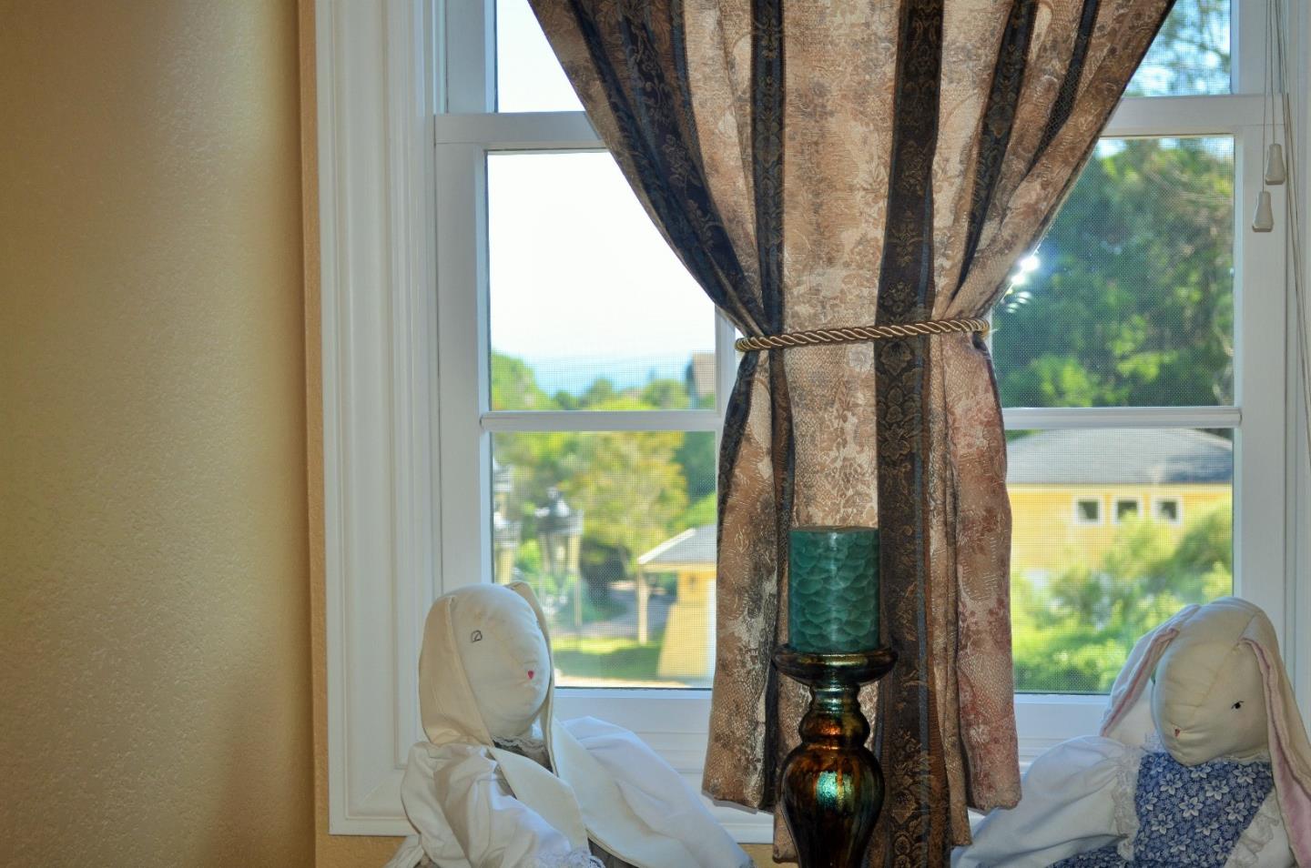 385 Tolak Road Aptos, CA 95003 - Photo 48 of 82 a living room with furniture and a floor to ceiling window
