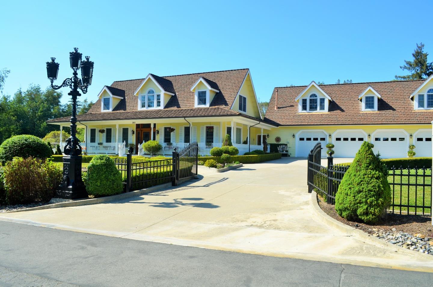 385 Tolak Road Aptos, CA 95003 - Photo 6 of 82 a front view of a house with a garden and plants