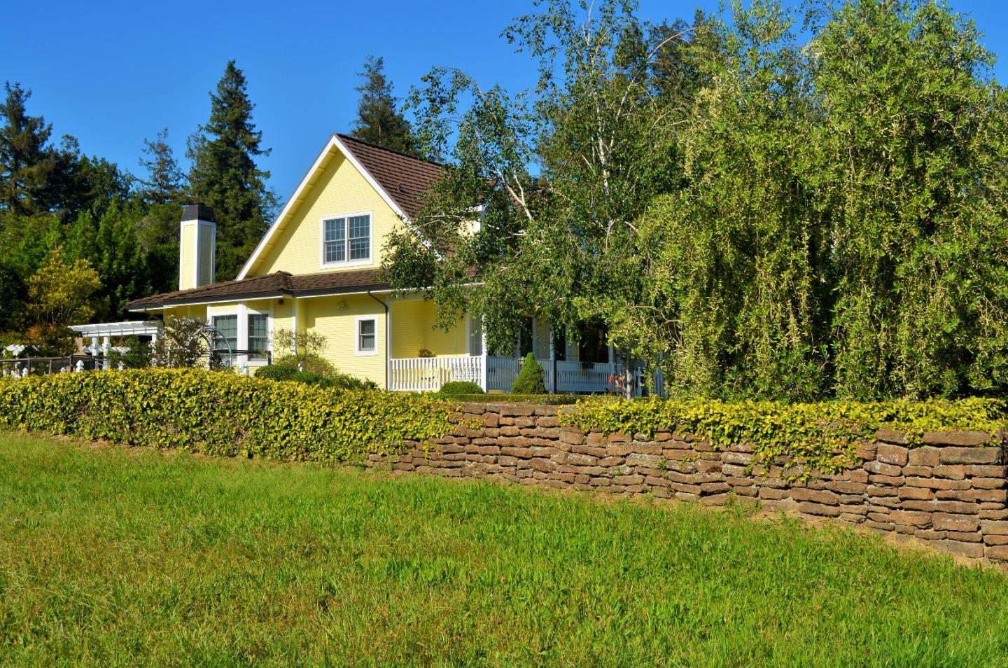 385 Tolak Road Aptos, CA 95003 - Photo 82 of 82 a front view of a house with a garden