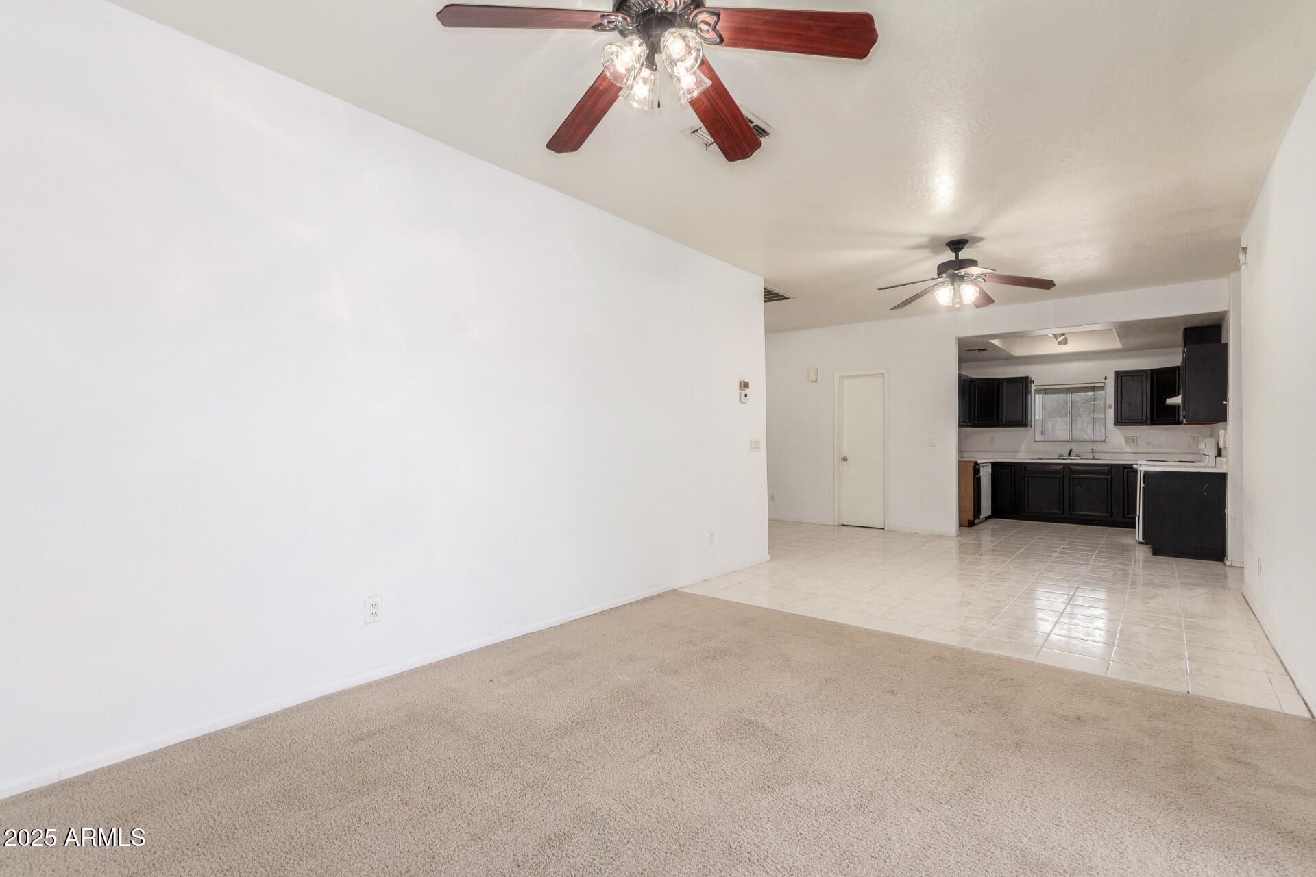 8676 West Mountain View Road Peoria, AZ 85345 - Photo 12 of 33 a view of a kitchen with a sink and cabinets