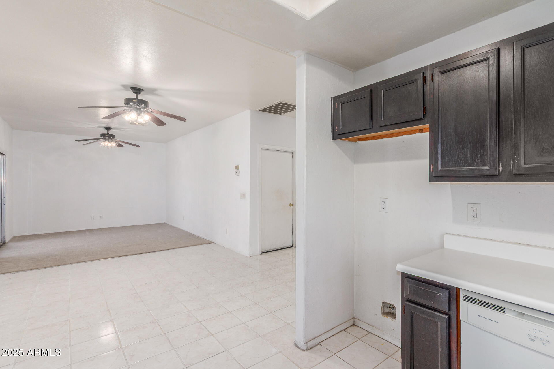 8676 West Mountain View Road Peoria, AZ 85345 - Photo 16 of 33 a view of a kitchen with a sink and dishwasher