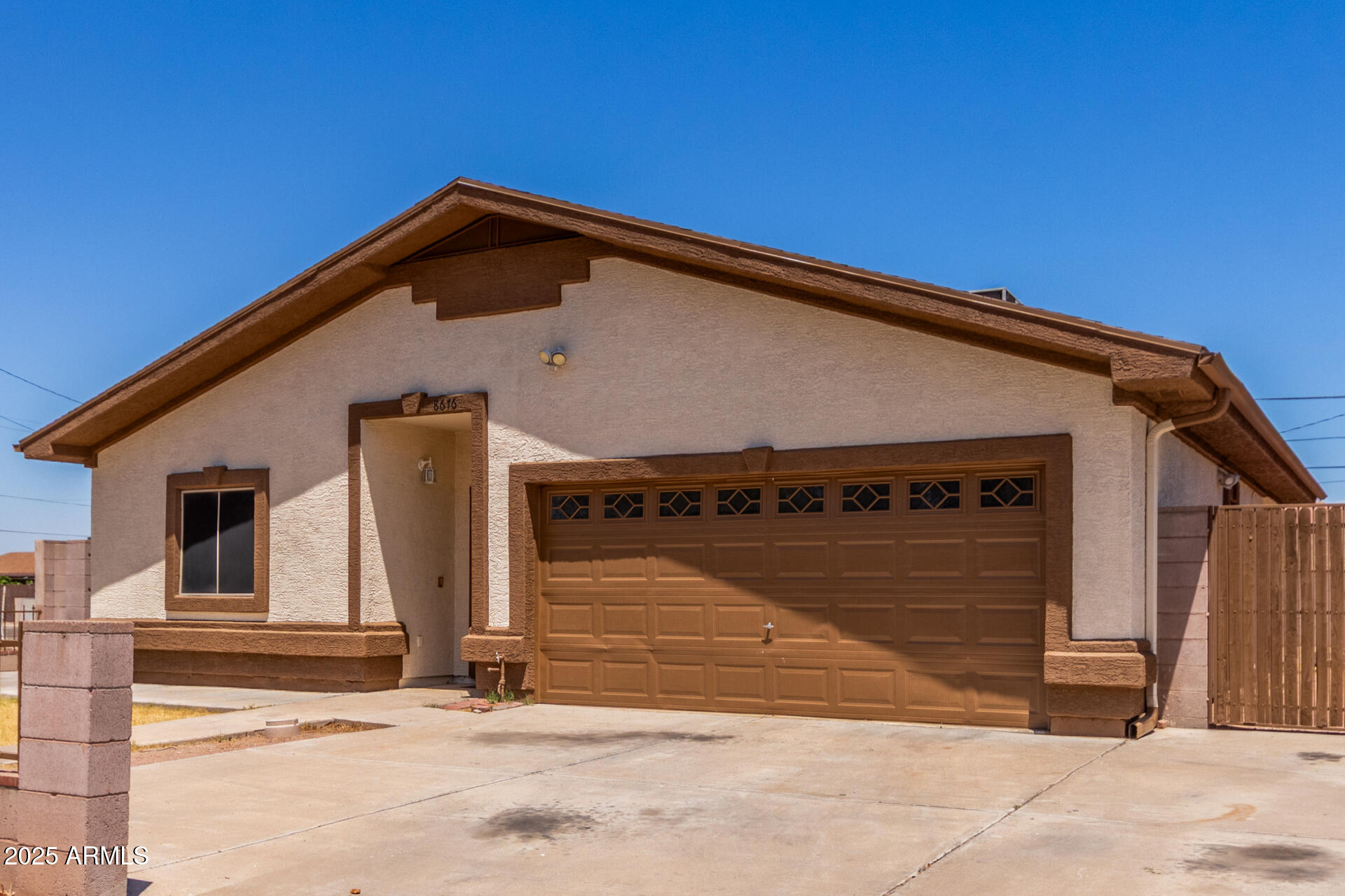8676 West Mountain View Road Peoria, AZ 85345 - Photo 4 of 33 a view of a house with a outdoor space