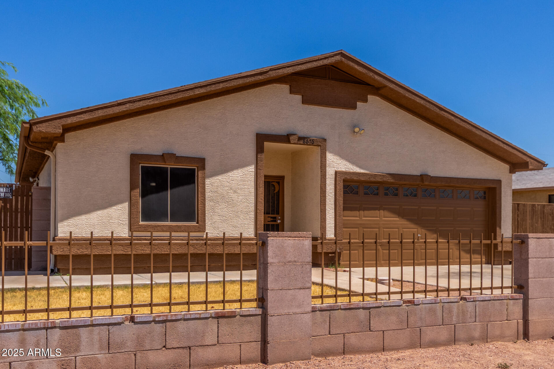 8676 West Mountain View Road Peoria, AZ 85345 - Photo 6 of 33 a front view of a house